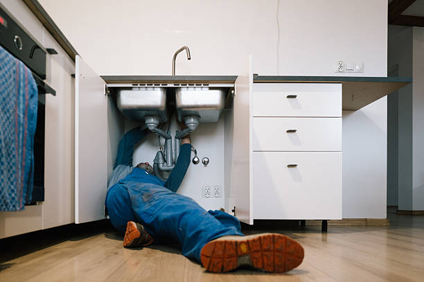 Professional Drain Cleaning technician working in Mastic Beach, NY